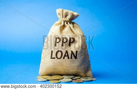 Money Bag With The Word Ppp Loan - Paycheck Protection Program. Loan Designed To Provide A Direct In
