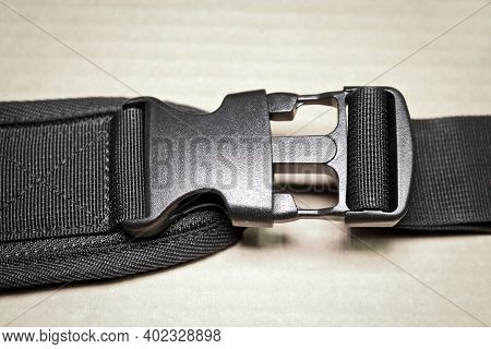 Black Plastic Buckle Fastex For Backpacks. Accessories For Backpacks, Fastener Close-up.