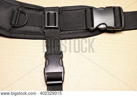 Black Plastic Buckle Fastex For Backpacks. Accessories For Backpacks, Fastener Close-up.