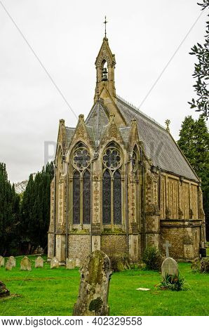 Historic Church Of Saint Mary In The Village Of Itchen Stoke In Hampshire On A Cloudy Autumn Day.
