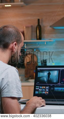 Freelancer Editing A Video Using Post Production Software Working From Home Overtime Sitting In The 