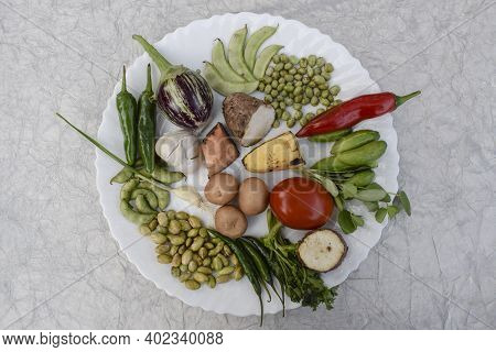 Top Vide Of All Fresh Vegetables Used In Preparation Of Making Undhiyu Or Oondhiyu A Gujarat Traditi