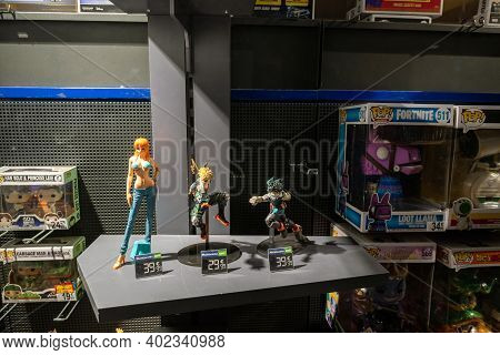 Strasbourg, France - Jan 1, 2021: Figurines Cartoon Manga Characters On Sale In The Showcase Window 