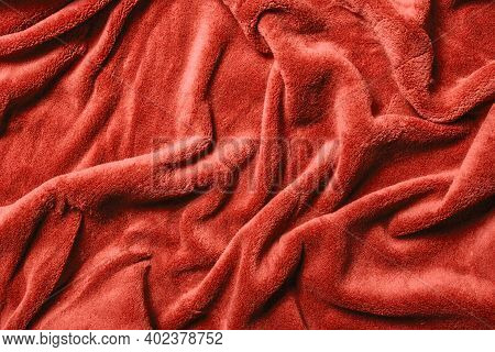Soft Fabric Background. Red Blanket Texture. Wave Material Pattern. Decorative Curtain Textile Backg