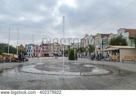 Puck, Poland - September 20, 2020: Water Fountain At Market Square At Cloudy Day.