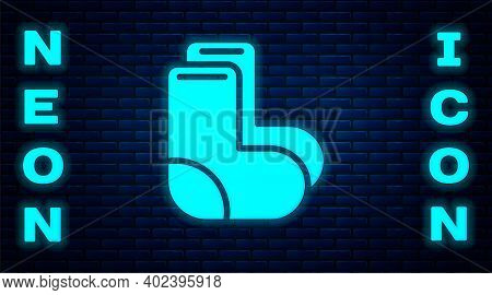 Glowing Neon Valenki Icon Isolated On Brick Wall Background. National Russian Winter Footwear. Tradi