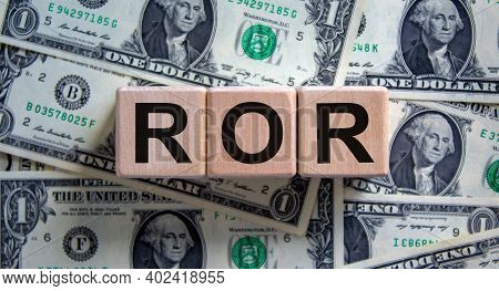 Ror - Rate Of Return Symbol. Concept Word 'ror - Rate Of Return' On Cubes On A Beautiful Background 