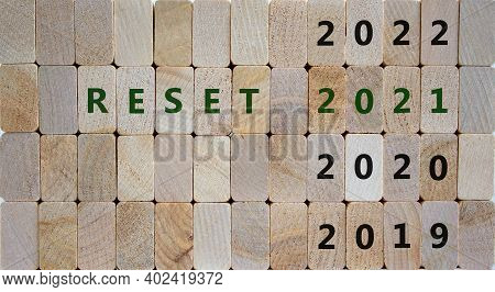 2021 Reset New Year Symbol. Wooden Blocks With The Inscription 'reset 2021'. 2019, 2020, 2022 Number