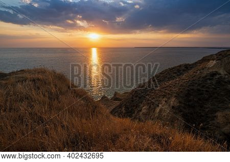 Picturesque Sunset Landscape Of Stanislav Clay Mountains And Canyons Above Dnipro River Bay Near The