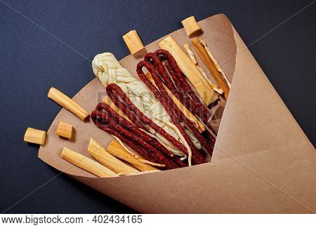 Original Edible Gift For Man In The Form Of A Bouquet Consisting Of Sausages, Smoked Cheese, Spicy C