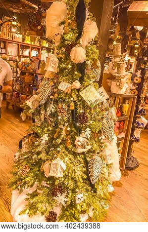 A Tree Decorated With Christmas Ornaments On Display At A Cracker Barrel Restaurant In Fishkill, New