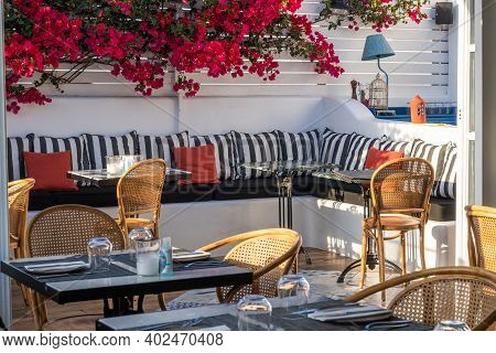 Santorini, Greece - September 17, 2020: Greek Estaurant In Oia Village On Santorini Island, Cyclades