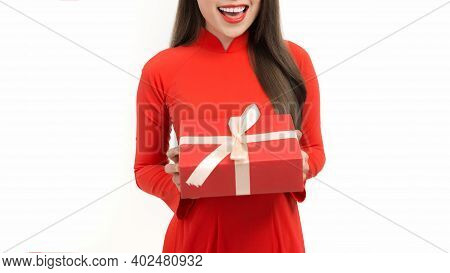 Woman In Vietnamese Tranditional Costume Hold With Gift Box