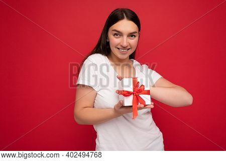 Shot Of Attractive Positive Smiling Young Brunette Woman Isolated Over Colourful Background Wall Wea