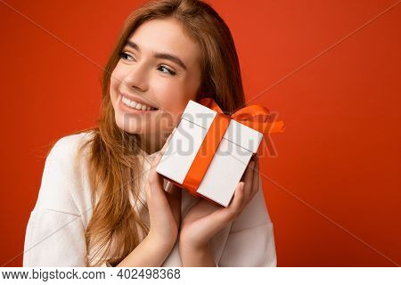 Closeup Portrait Photo Of Beautiful Happy Blonde Young Female Person Isolated Over Orange Background