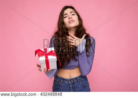 Shot Of Beautiful Happy Astonished Brunet Curly Young Female Person Isolated Over Pink Background Wa