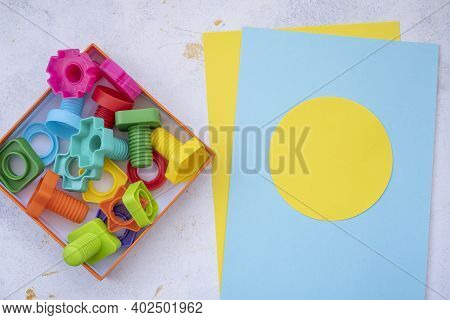 Mock Up Background Educational Constructor For Children, Nuts And Bolts In The Form Of Geometric Sha
