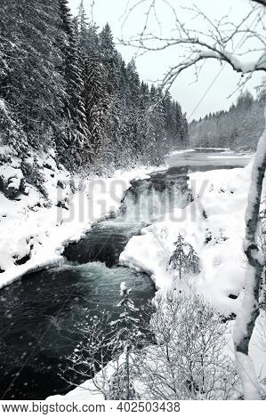 Kivach Waterfall In The Winter Forest In Karelia, Russia