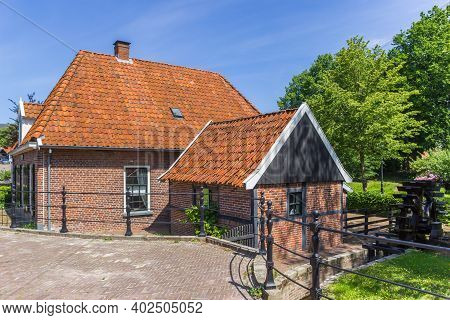 Historic Water Mill Molenhuisje In The Center Of Ootmarsum, Netherlands