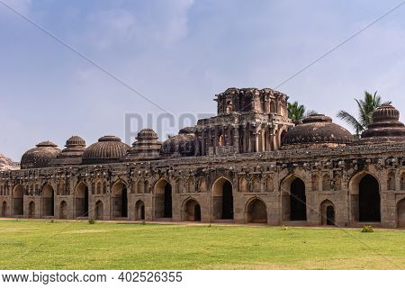 Hampi, Karnataka, India - November 5, 2013: Zanana Enclosure. Brown Stone Large Linear Building Is S