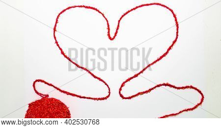 Red Woolen Thread In The Shape Of Heart And Tangle On White Background. Valentines Day. Health, Medi