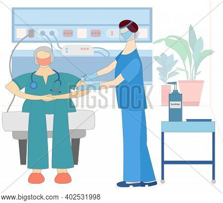 Doctor Injecting Vaccine In A Doctors Shoulder