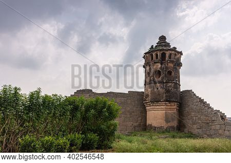 Hampi, Karnataka, India - November 5, 2013: Zanana Enclosure. Southern Ruinous Brown-stone Watchtowe