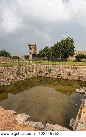Hampi, Karnataka, India - November 5, 2013: Zanana Enclosure. Closeup Of Tank Or Pool Up Front And B