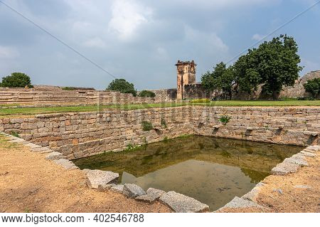 Hampi, Karnataka, India - November 5, 2013: Zanana Enclosure. Corner Closeup Of Tank Or Pool Up Fron