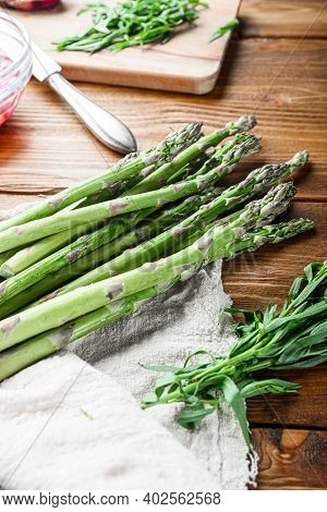 Organic Asparagus Eggs And French Dressing Ingredients With Dijon Mustard, Onion Chopped In Red Vine