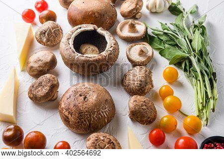 Garlicky Mushrooms Ingredients For Baking Portobello, Cheddar Cheese, Cherry Tomatoes And Sage  On W