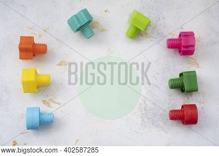 Educational Constructor For Children, Nuts And Bolts In The Form Of Geometric Shapes. Mock Up Backgr