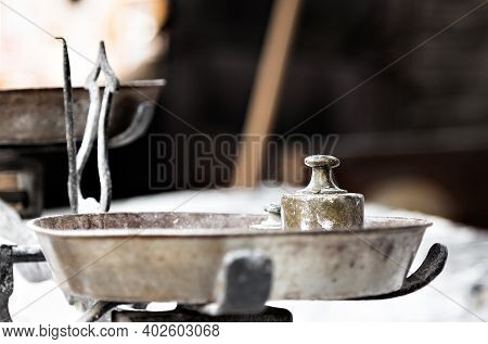 Steelyard  With Weights On A Traditional Craftsman Market.horizontal Image.