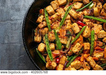 Vegetarian Meat Free Mycoprotein Pieces Vegetable Stir Fry Served In Cast Iron Skillet Frying Pan