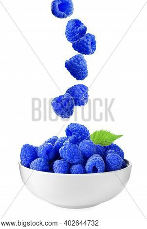 Fresh Blue Raspberries Falling Into Bowl On White Background