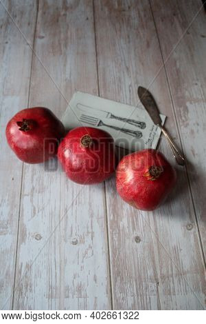 Three Beautiful Red Grenades, Grenades On The Table, Old Knife Next To Grenades, Vintage Knife