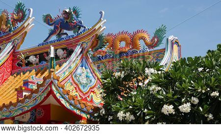 Traditional Oriental Taoist Chinese Monastery Temple Roof Details, Festive Dragon Decoration. Classi