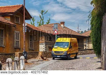Bergamo, Italy - May 22, 2019: Minivan Of The Dhl Company. Dhl International Gmbh Is A German Courie