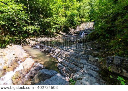 Waterfall Mountain Landscape. Place For Relaxation And Connecting With Nature