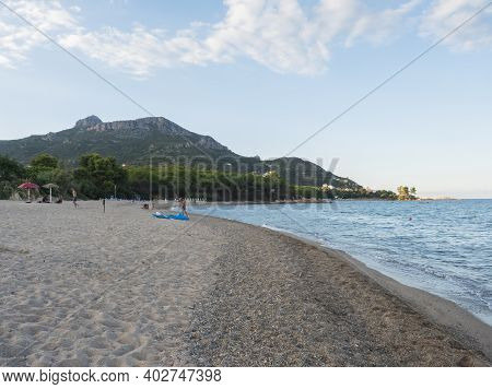 View Of Sand Beach Spiaggia Di Santa Maria Navarrese Sea With Green Forest And Limestone Rock Monte 