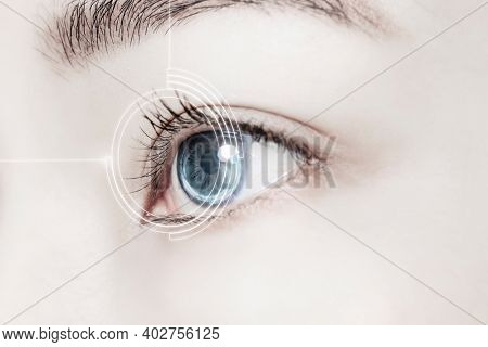 Woman's eye with smart contact lens