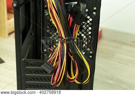 Cables And Wires From The Power Supply For Connection To Computer Components. Cable Management And P