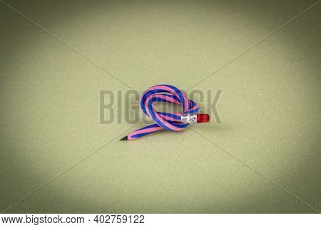 Flexible Pencil On A Light Background. Selective Focus