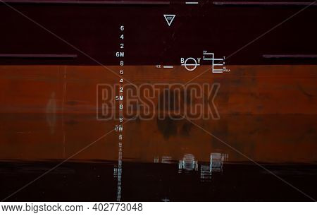Plimsol Line And Draught Lines On The Steel Hull Of A Large Cargo Ship.