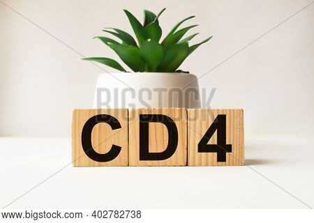 A Word Cd4 On Wooden Cubes. Business Concept. Business And Finance