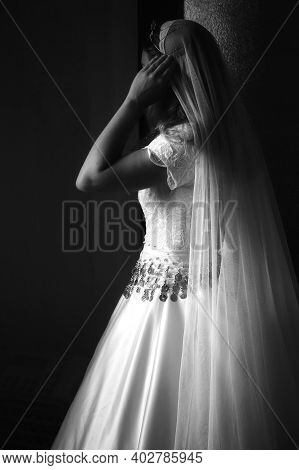 Bride In Beautiful White Dress During Wedding Preparation