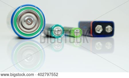 Battery Type D Or C, Pp3, Aa, Aaa On A White Background With Reflection. View Of Metal Alkaline Batt
