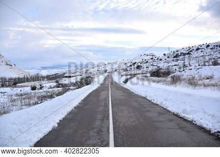Regional Road In The Cidacos Valley, La Rioja. Scene After The Snowstorm Called Filomena In Spain. J
