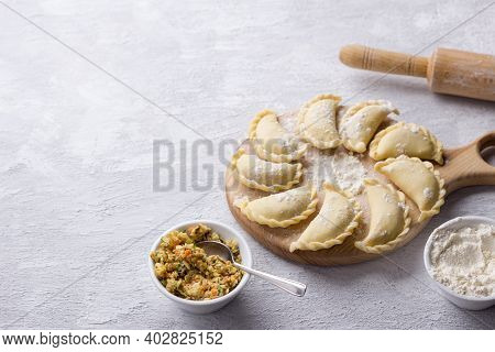 Homemade Raw Frozen Vegan Dumplings, Vareniki, Pierogi, Kreplach  Stuffed With Vegan Lentil 