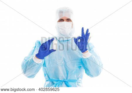 Treating Novel Coronavirus Pneumonia. Pulmonologist Give Ok Sign To Drug Bottle. Coronavirus Treatme